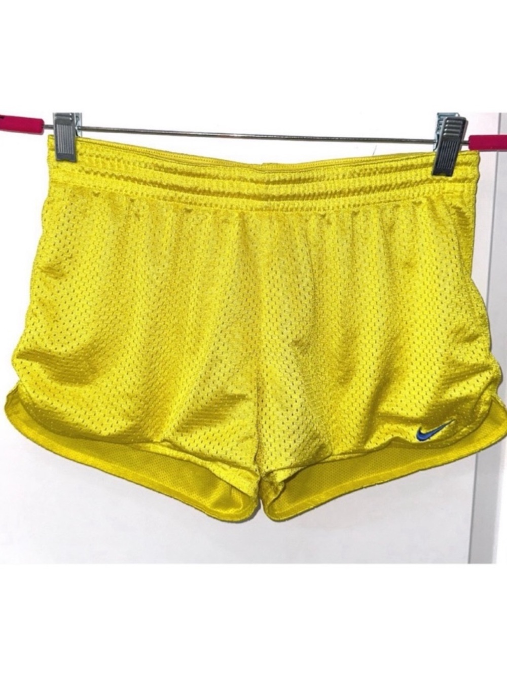 Nike athletic shorts in bright yellow